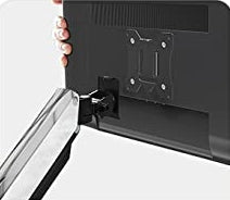 place monitor on the vesa mount