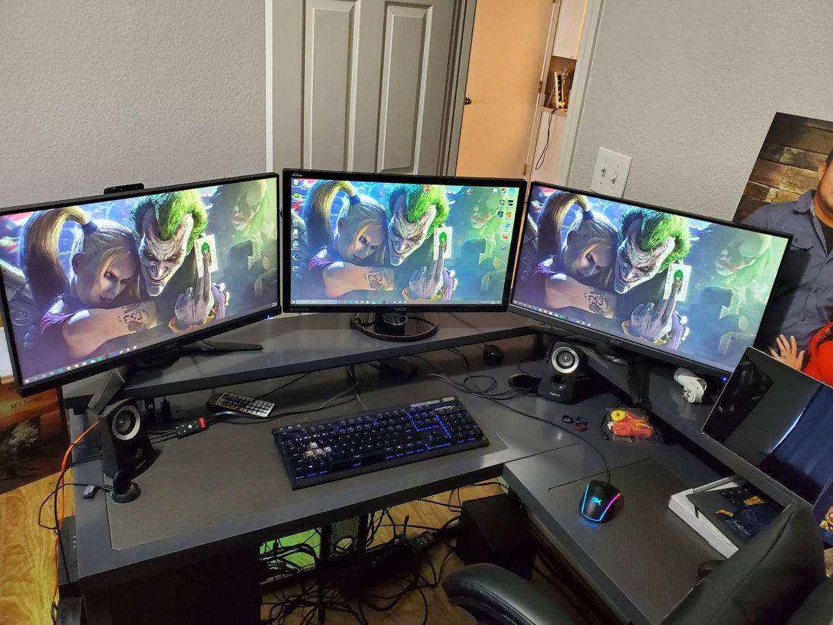 clean desk setup with two single monitor mounts