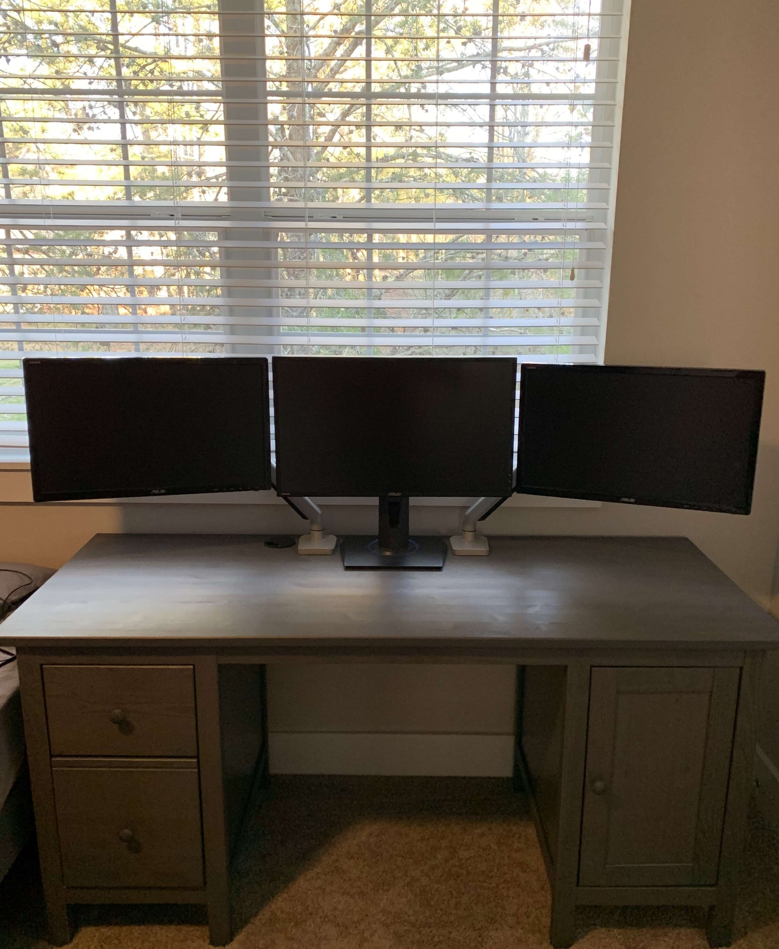 clean desk setup with two single monitor mount