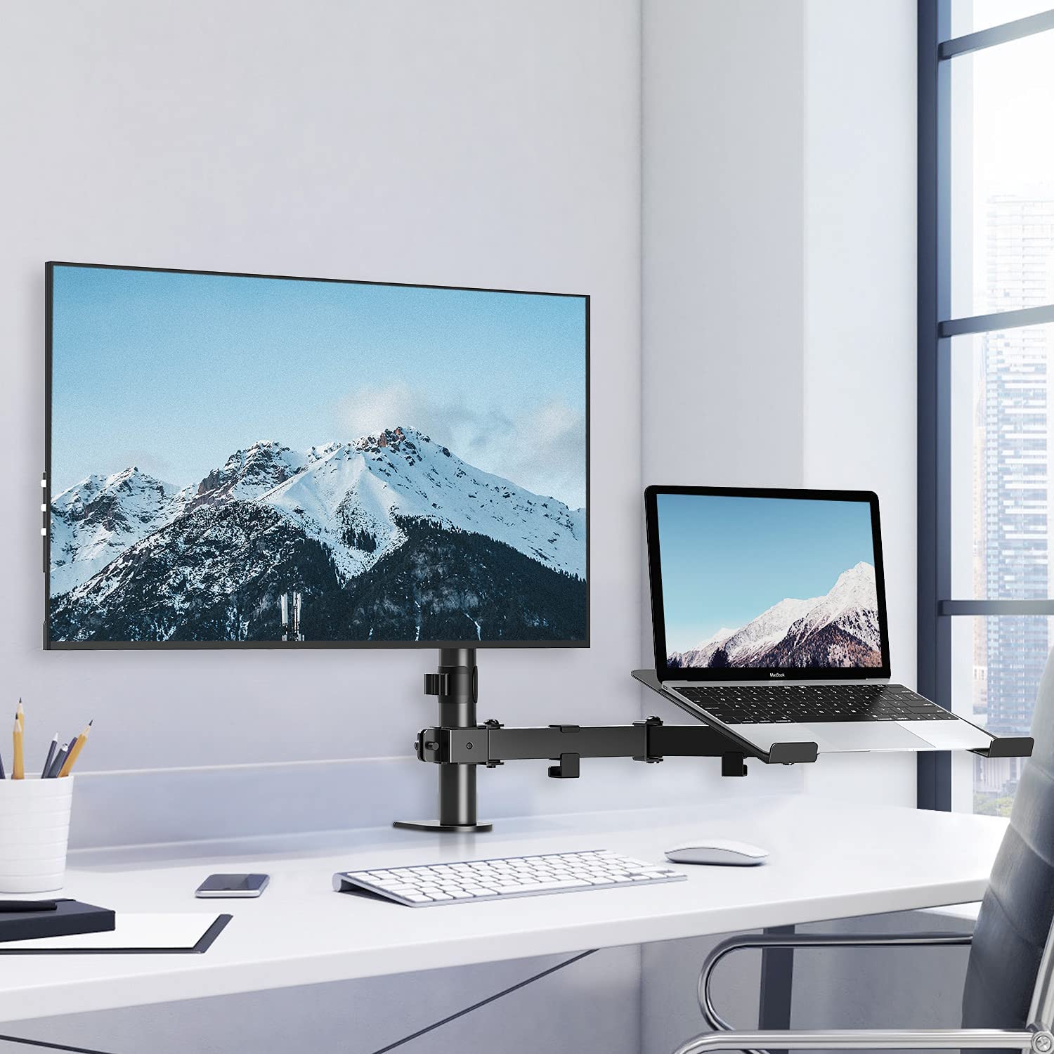 laptop and monitor stand in the office